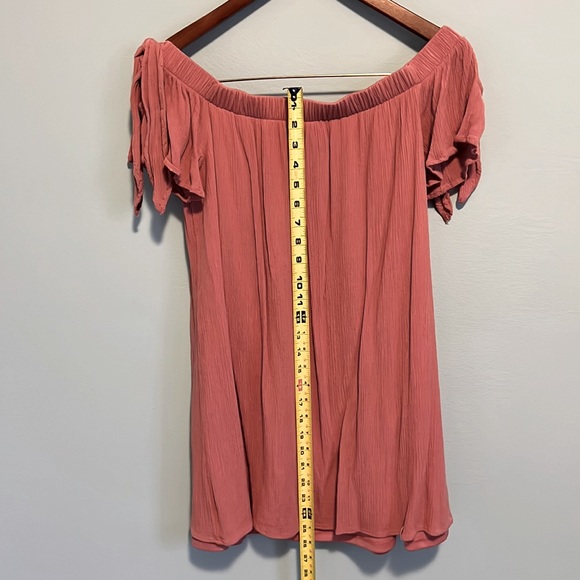 Off the shoulder mauve mini dress with ties and keyhole at top of sleeve. - Picture 2 of 5